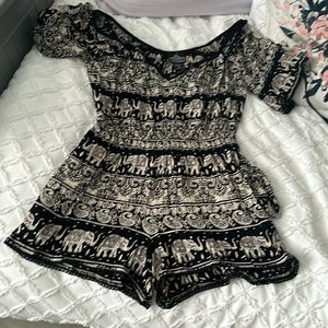 Angie Medium romper, black and beige elephant design